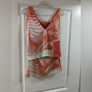 Roberto Cavalli Top is a size large and skirt is a size small 97% Silk